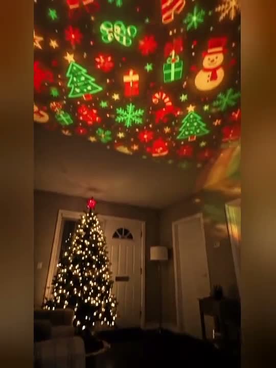 Video still showing the Christmas projection in a room